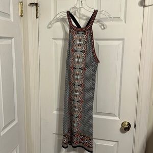 A-line dress black patterned dress with coral/red highlights